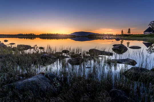 Midnight sun over a lake in Arjeplog, Sweden