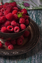 Fresh  raspberries in vintage basket, vitamins, healthy food, ve