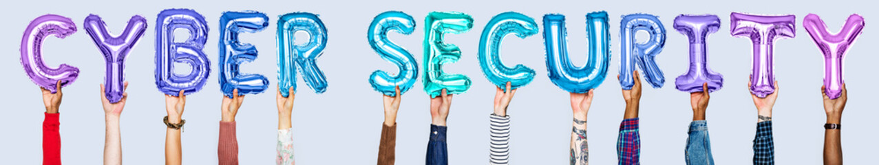 Hands holding cyber security word in balloon letters