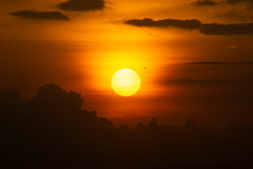 Sunset sky with silhouette cloud