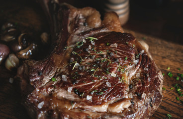 Tomahawk on a wooden board food photography recipe idea