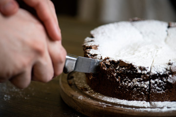 Patisserie slicing chocolate fudge cake photography recipe idea