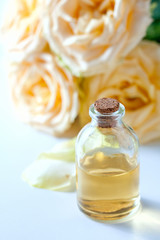 Glass jar with rose water and aromatherapy, copy space for text.