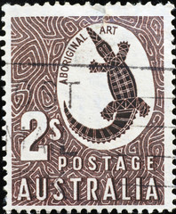 Australian postage stamp, crocodile drawn in aboriginal style