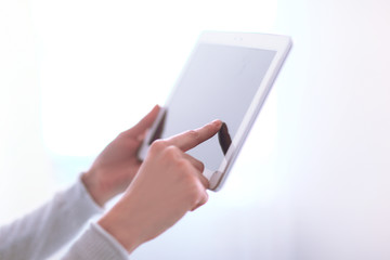 close up.woman's hand pressing on screen digital tablet .photo w