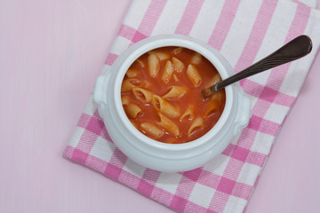 Delicious tomato soup with noodles.