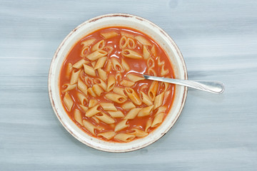 Delicious tomato soup with noodles.