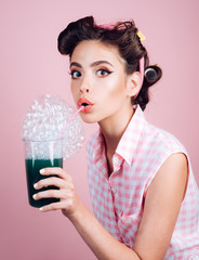 pinup girl with fashion hair. pin up woman with trendy makeup. perfect housewife. retro woman drink summer cocktail. pretty girl in vintage style. This is the real life.