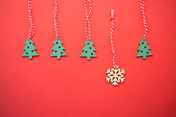 wooden Christmas toys, Festive christmas decoration on the red background with copy space