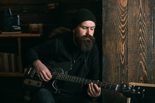 Lets rock. Rock guitarist playing music. Rock style man. Rock and roll  music performer. Electric guitar player. Hipster musician. Bearded man play  the guitar Stock Photo | Adobe Stock