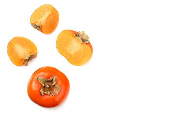 fresh ripe persimmons with slices isolated on white background. top view