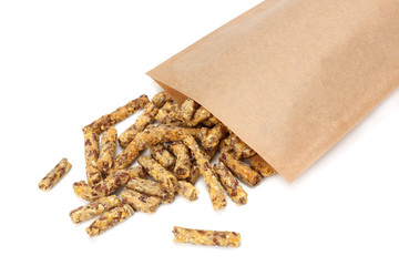 Granola breakfast in kraft paper bag isolated on white background. muesli. healthy food. fitness food.