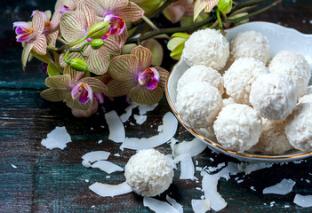 yellow orchid and нomemade coconut sweets.