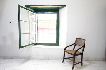  chairs and green windows