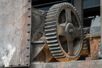 Fototapeta na wymiar historig gears in a industrial facility