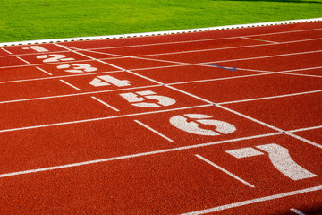 Fototapeta premium Red running track for athletics at stadium