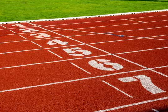 Red Running Track For Athletics At Stadium