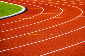 Fototapeta premium Red running track for athletics at stadium