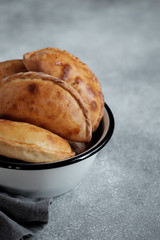 Homemade cakes in a white metal plate