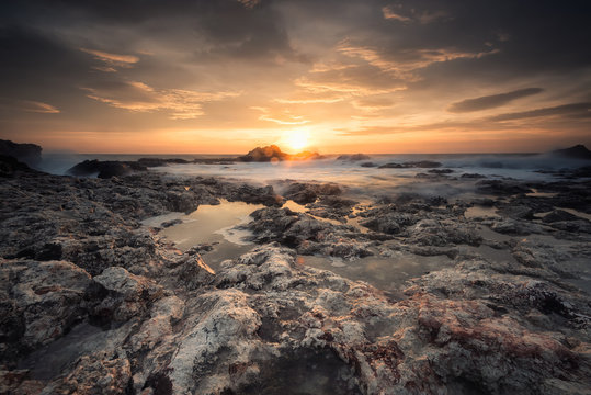 Sunrise on a rocky beach / Magnificent sea sunrise at the rocky Black sea coast © Jess_Ivanova