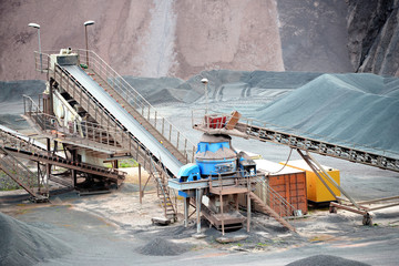 stone crusher in a quarry mine of porphyry rocks.