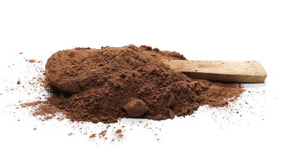 Cocoa powder pile with wooden spoon isolated on white background