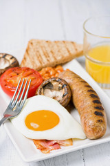 Classic English breakfast served. Close view.