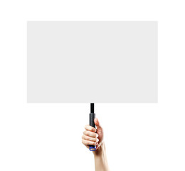 Hand holding a white blank plate with a handle. Close up. Isolated on white background.