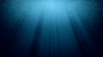 Abstract background with motion of shining blinking particles on blue background with rays of light.. VJ Seamless loop.