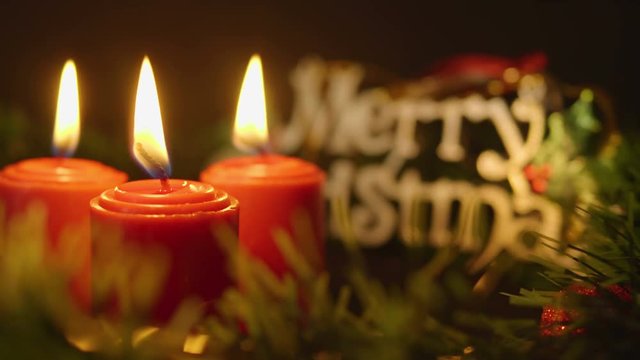 Footage of candle burning for Merry Christmas day