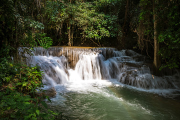 Beautiful of Huai Mae Khamin waterfall at Kanchanaburi, Thailand with tree forest background