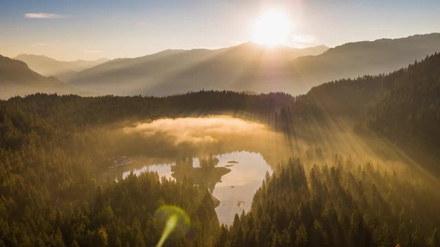 Aerial footage from the beautiful Lake Cauma surrounded by the mountains, located in Flims, Switzerland. Filmed during the sunrise with the DJI Inspire 2 drone in 5.2k RAW and downscaled to 4k.