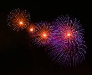Colorful amazing fireworks isolated in dark background close up with the place for text, Malta,...