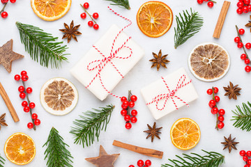 Christmas greeting card. Christmas tree branch on glitter golden bokeh lights background. New Year concept. Copy space.