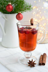Hot drink with cranberries and cinnamon