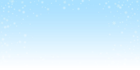 Sparse glowing snow Christmas background. Subtle f