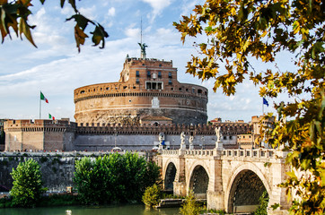 View of St. Angels Castle and the bridge leading to it through the Tiber, through the yellowing...