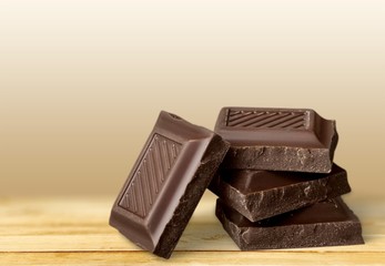 Delicious chocolates isolated on background