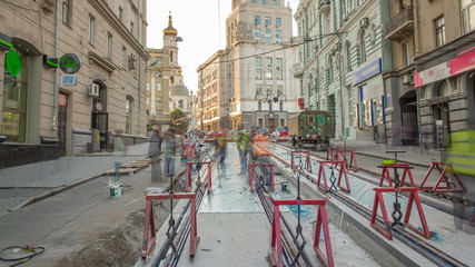 Tram rails at the stage of their installation and integration into concrete plates on the road timelapse.