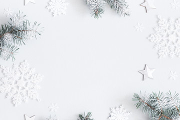 Christmas composition. Frame made of fir tree branches, decorations on pastel gray background. Christmas, winter, new year concept. Flat lay, top view, copy space - 236277315
