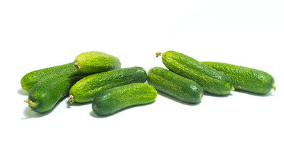 Fresh , green cucumbers isolated on white background