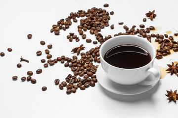 Coffee cup and beans on a white background