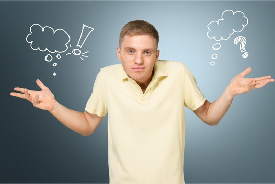 Confused, puzzled man with question