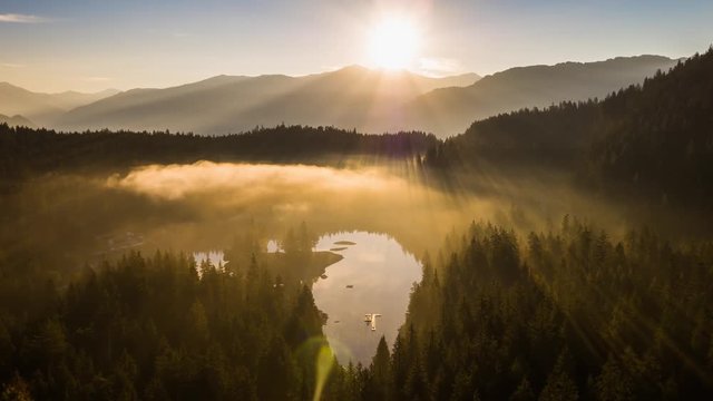 Aerial footage from the beautiful Lake Cauma surrounded by the mountains, located in Flims, Switzerland. Filmed during the sunrise with the DJI Inspire 2 drone in 5.2k RAW and downscaled to 4k.