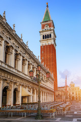 Fototapeta na wymiar Campanile and Venice Doge's palace on San Marco square in Venice, Italy. Venice Grand Canal. Architecture and landmarks of Venice.
