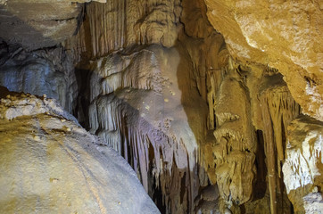 Stalactites in the karst cave. Russia, Republic of Crimea. 06.13.2018. In the cave 