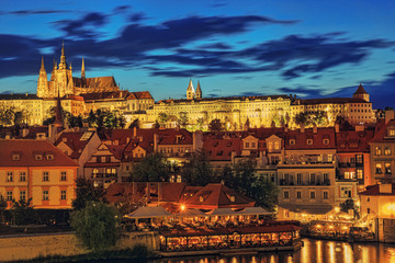 .Night panoramic view of Prague Castle and the Vltava River. Czech Republic.