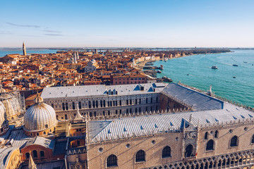 Venice panoramic aerial view with red roofs, Veneto, Italy. Aerial view of the Venice city, Italy. Venice is a popular tourist destination of Europe. Venice, Italy.