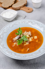 Traditional tomato fish soup