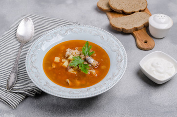 Traditional tomato fish soup